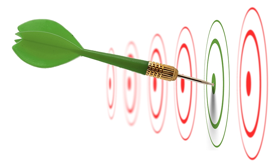 Dart hitting the center of a target among several targets